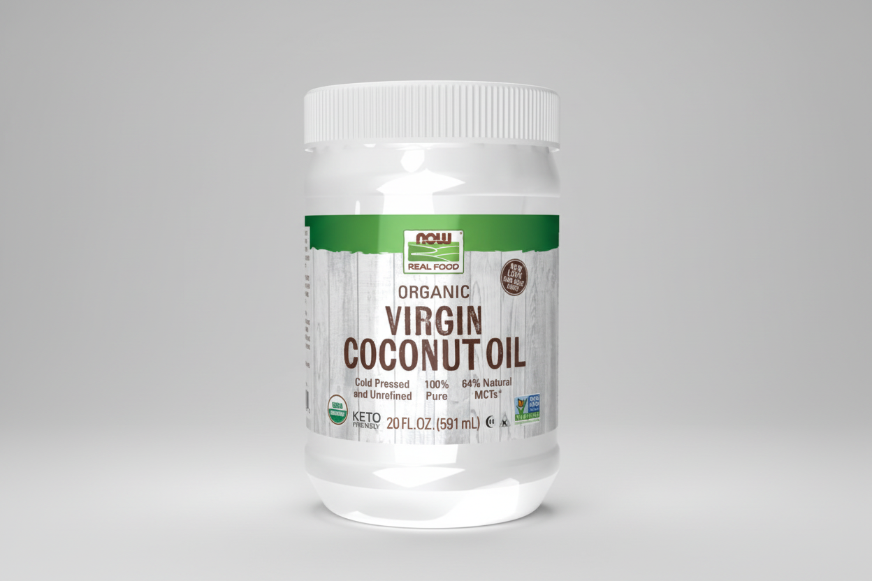 Jar of organic virgin coconut oil with a white lid on a white background