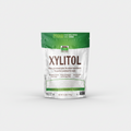Package of Xylitol with green and white design on a white background