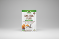 Package of Xylitol Plus sweetener packets with a cup of coffee and cookies on a white background.