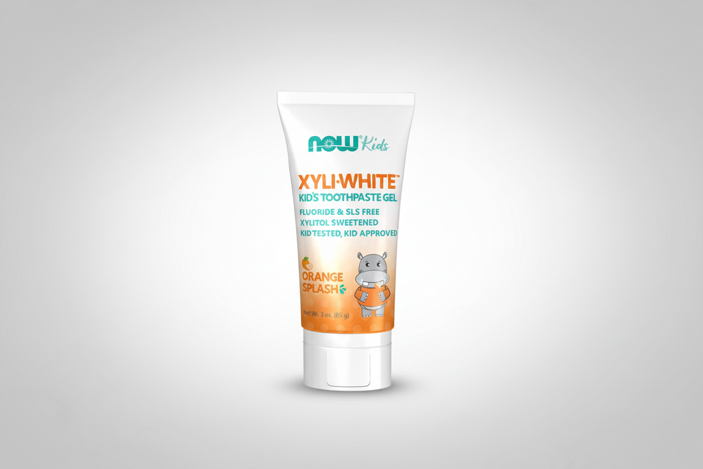Tube of NOW Kids Xyli-White Kids' Toothpaste Gel with hippo character on a white background