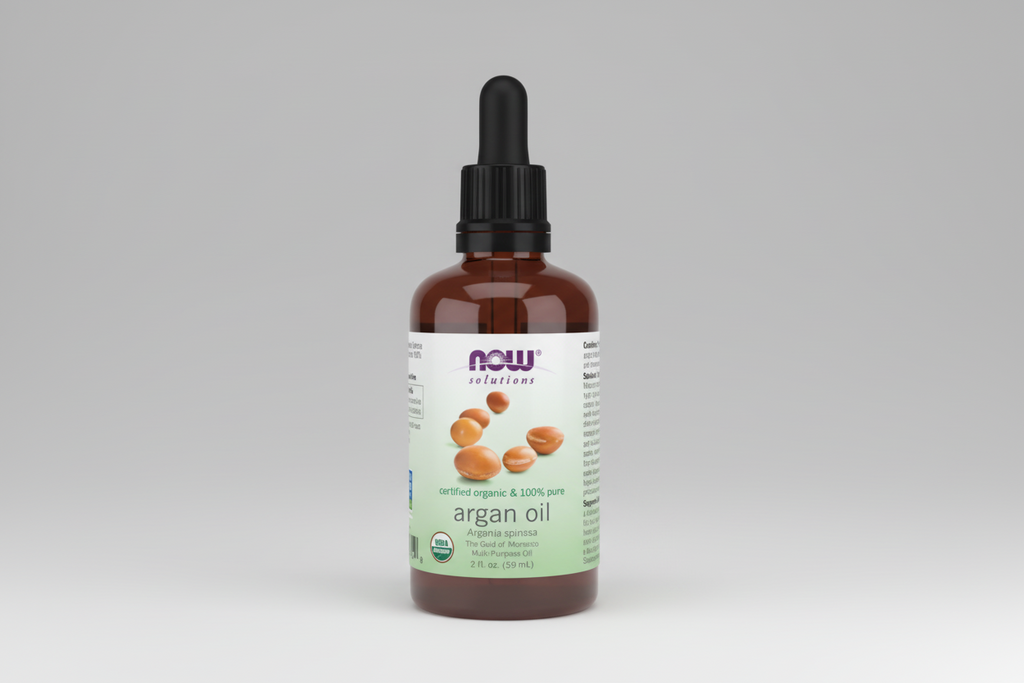 Bottle of NOW Solutions argan oil on a white background