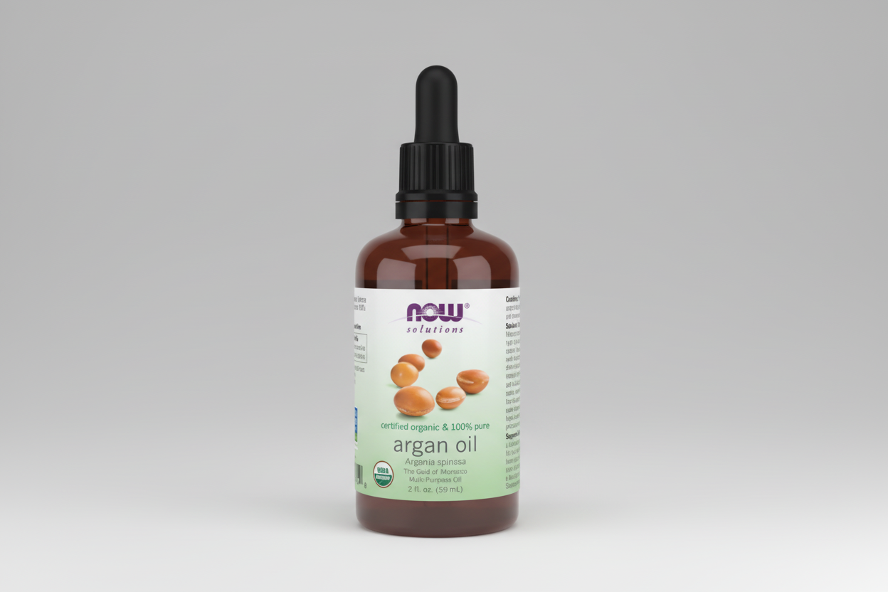 Bottle of NOW Solutions argan oil on a white background
