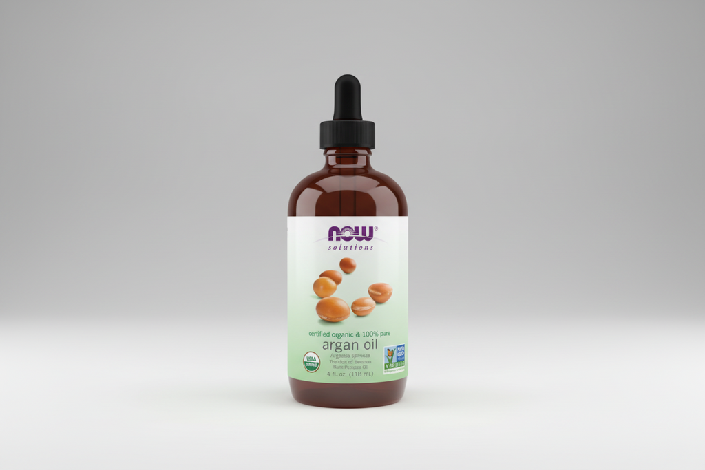 Bottle of NOW Solutions argan oil on a white background