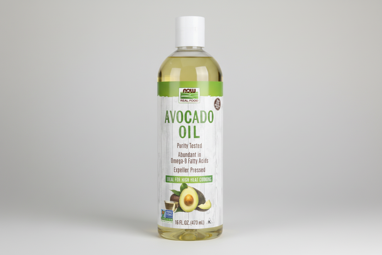 Bottle of avocado oil with a white label on a white background