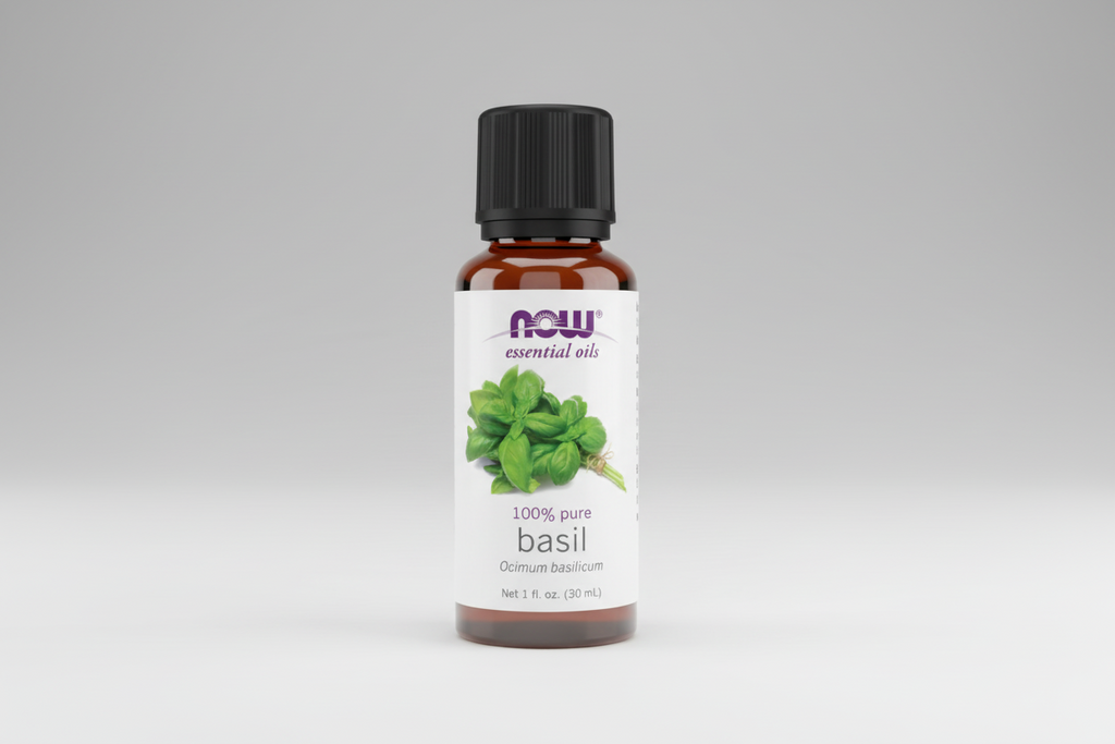 Bottle of Now Essential Oils basil oil on a white background