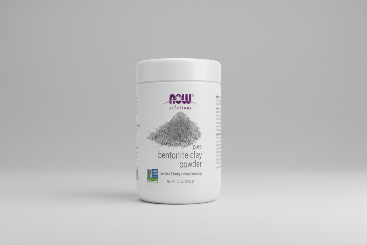 Bottle of NOW Solutions pure bentonite clay powder on a white background