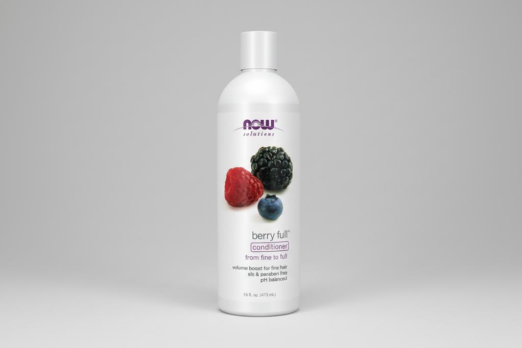 Bottle of NOW Solutions berry full conditioner on a white background