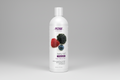Bottle of NOW Solutions berry full shampoo with berries on a white background
