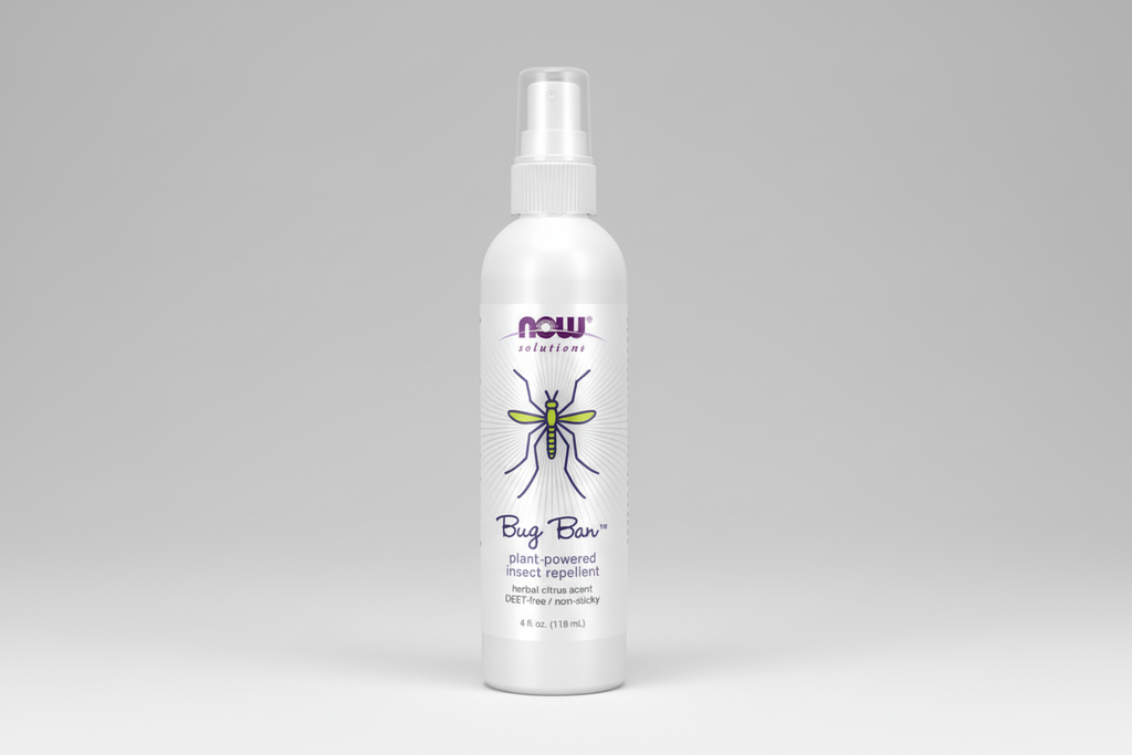 Bug spray bottle labeled 'NOW Solutions' on a white background