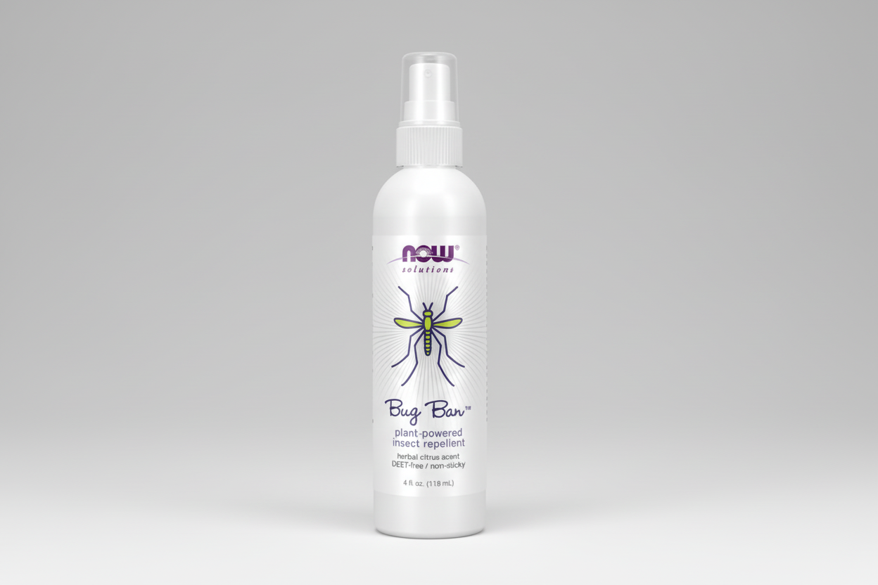 Bug spray bottle labeled 'NOW Solutions' on a white background