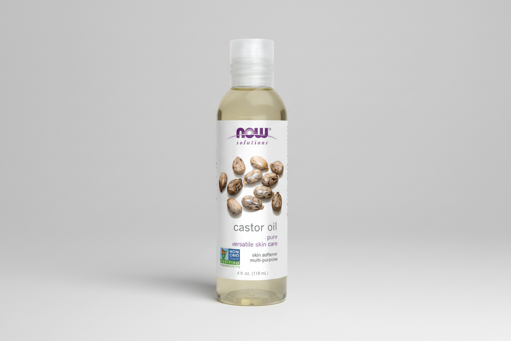 Bottle of NOW Solutions castor oil on a white background