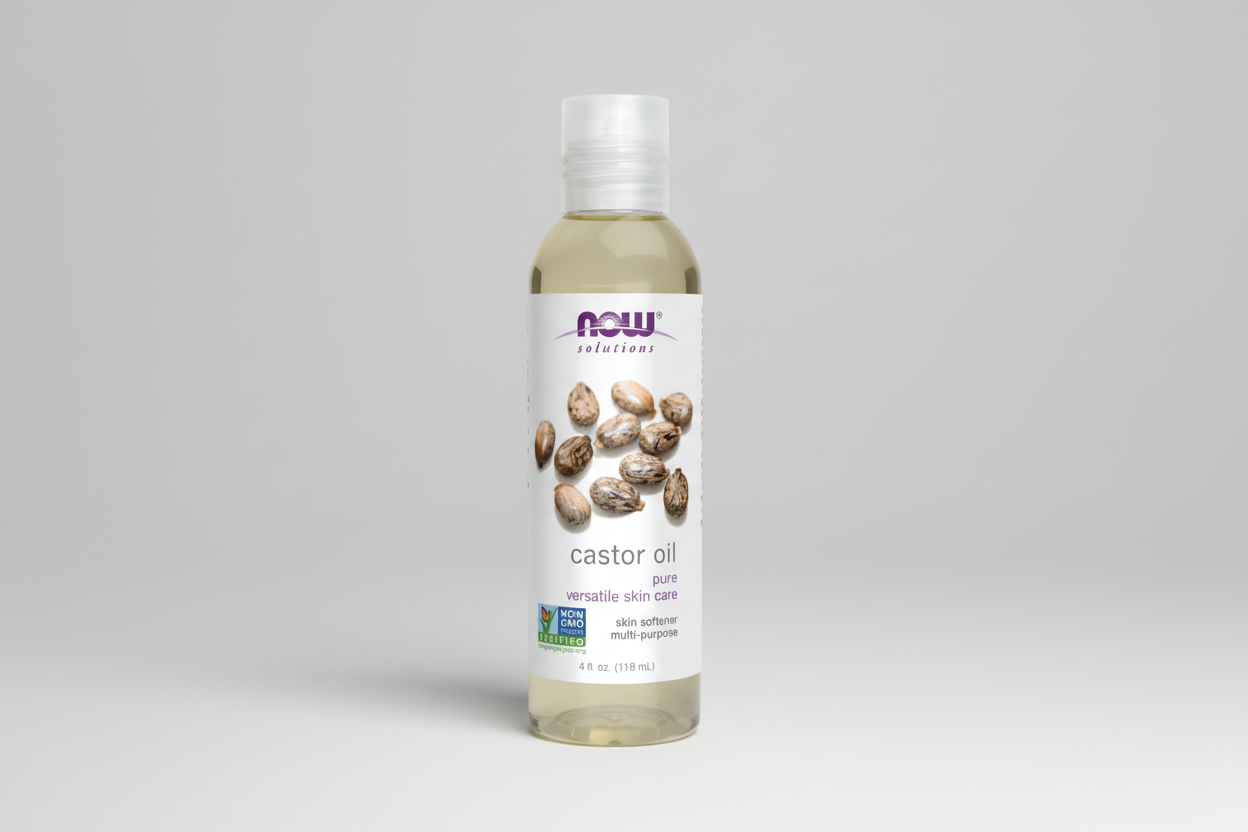 Bottle of NOW Solutions castor oil on a white background