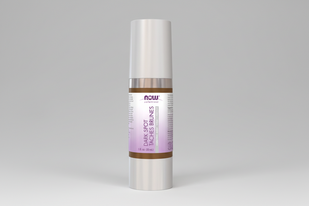 Skincare serum bottle with a white cap and purple label on a white background