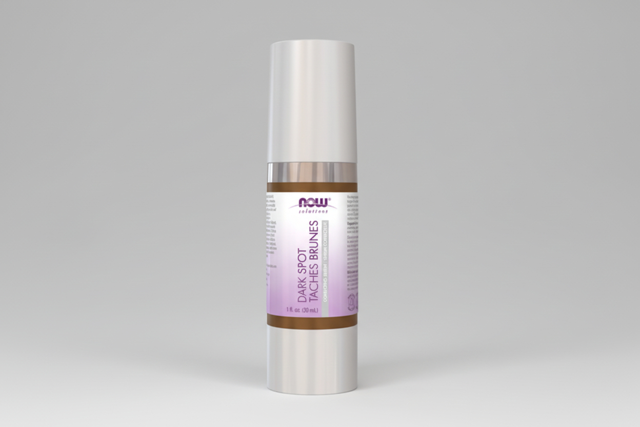 Skincare serum bottle with a white cap and purple label on a white background