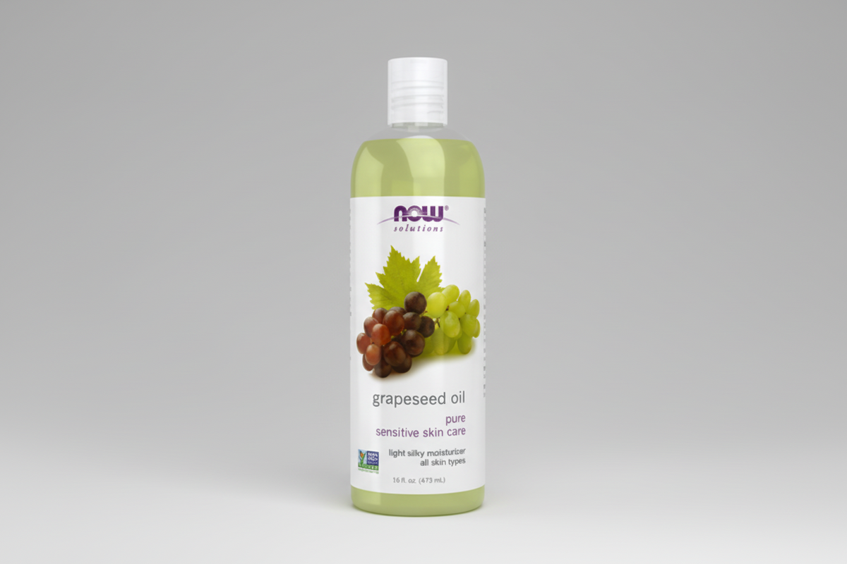 Bottle of NOW Solutions Grapeseed Oil on a white background
