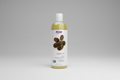 Bottle of NOW Solutions jojoba oil on a white background