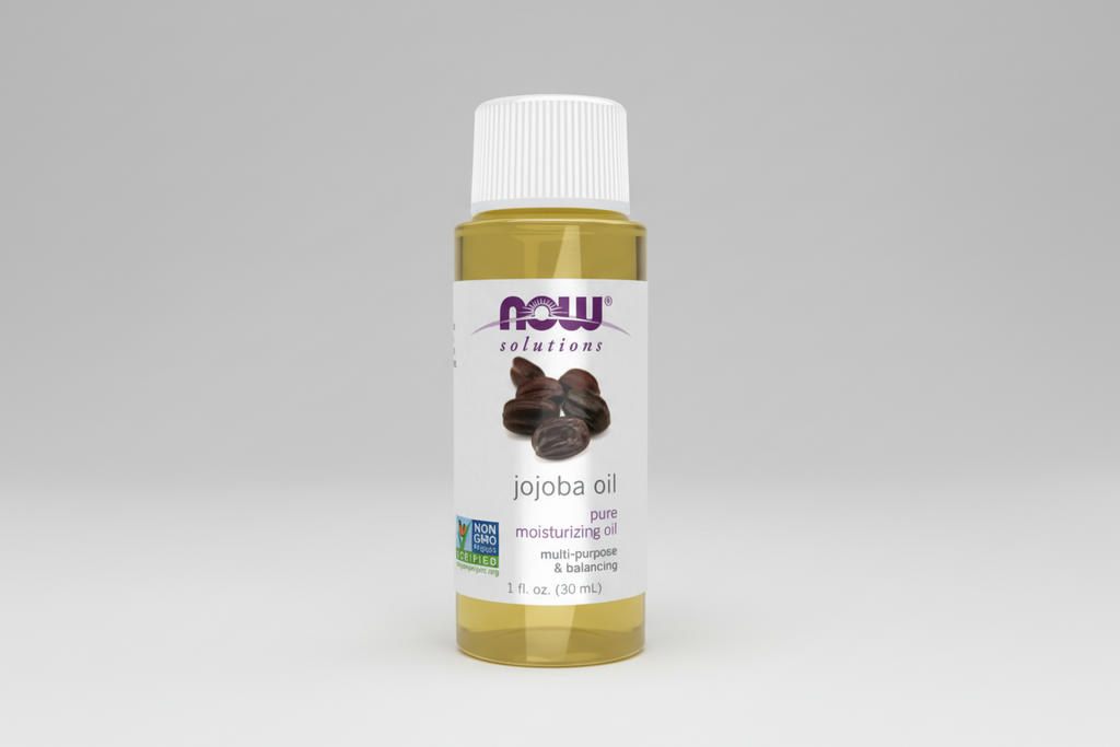 Bottle of NOW Solutions jojoba oil on a white background