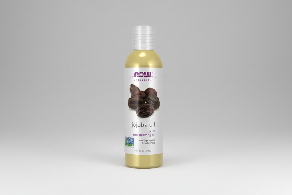 Bottle of NOW Solutions jojoba oil on a white background