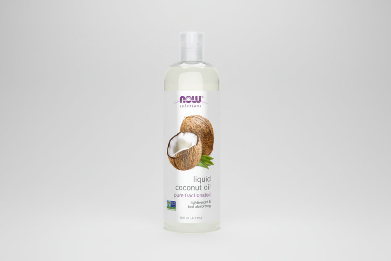 Bottle of NOW Solutions liquid coconut oil on a white background