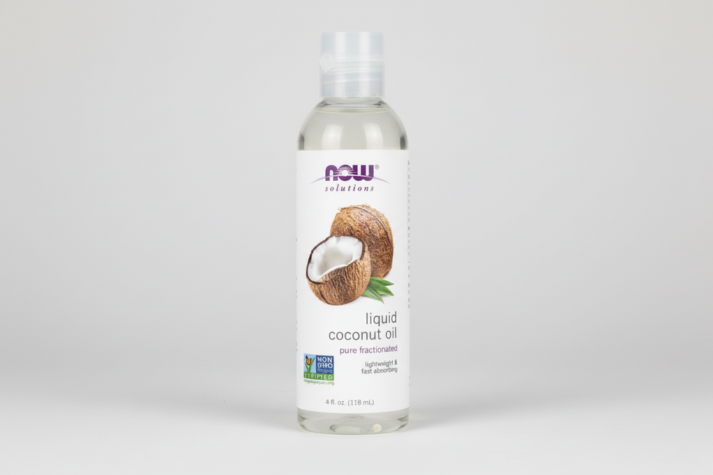 Bottle of NOW Solutions liquid coconut oil on a white background