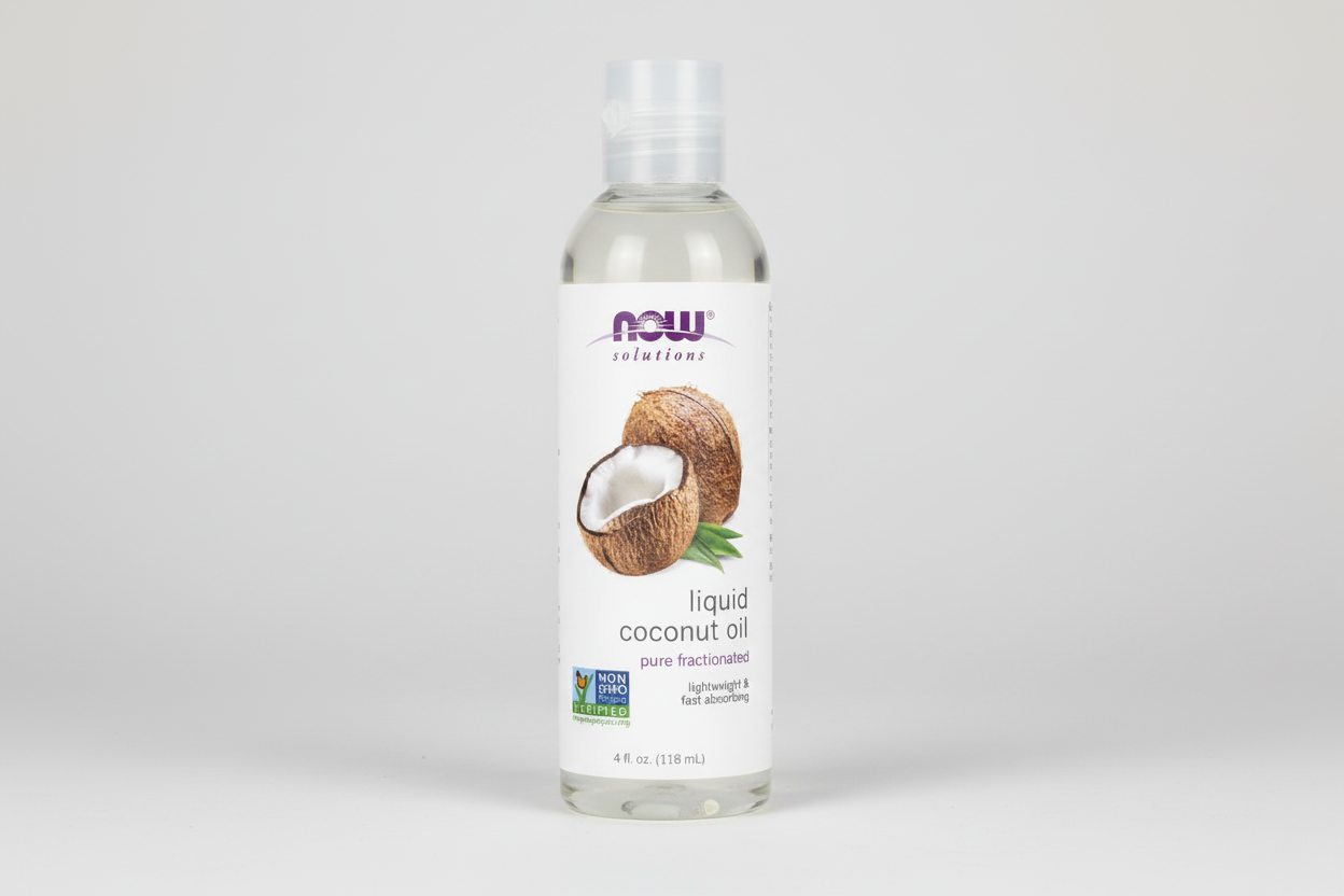 Bottle of NOW Solutions liquid coconut oil on a white background