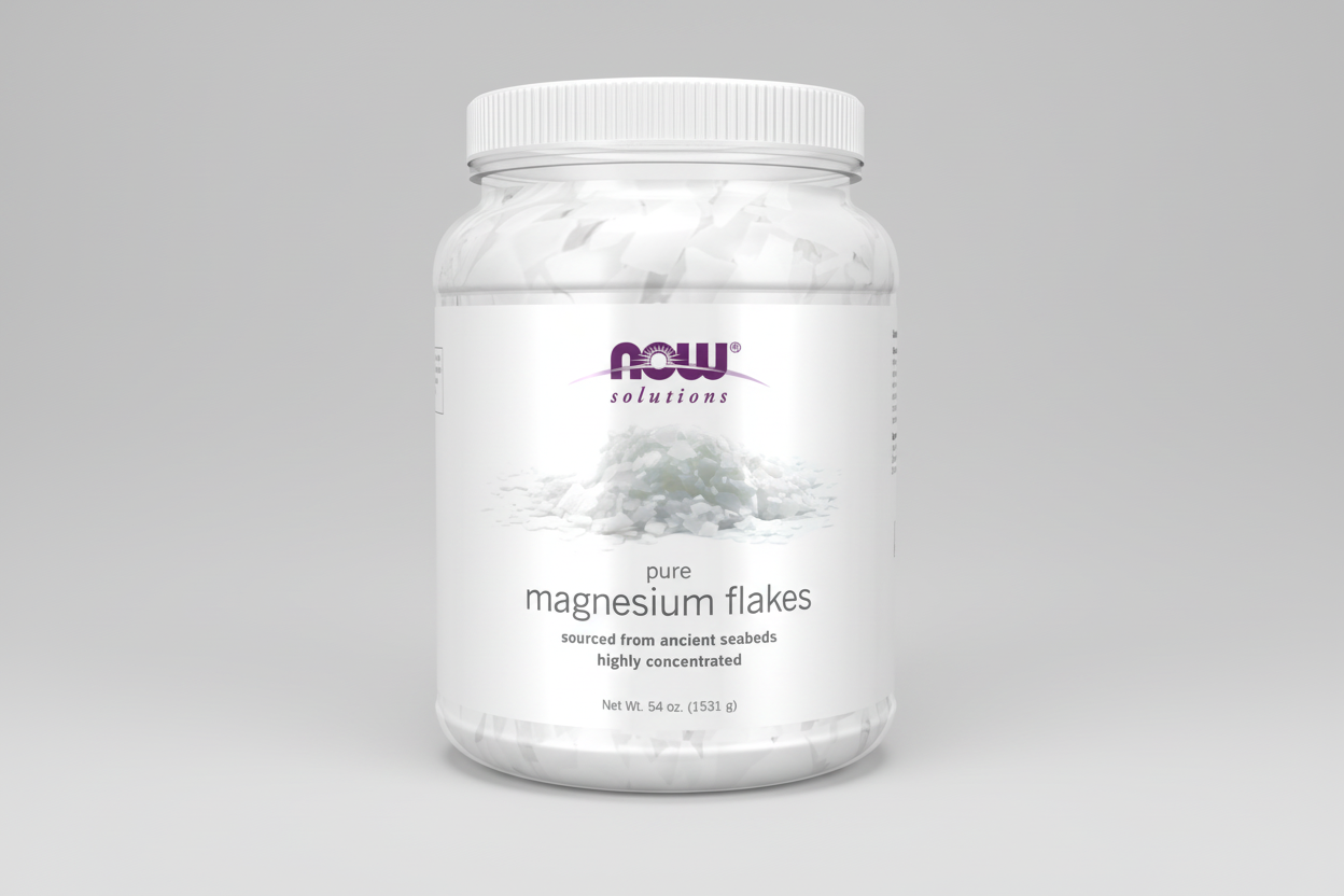 Container of pure magnesium flakes with NOW brand on a white background
