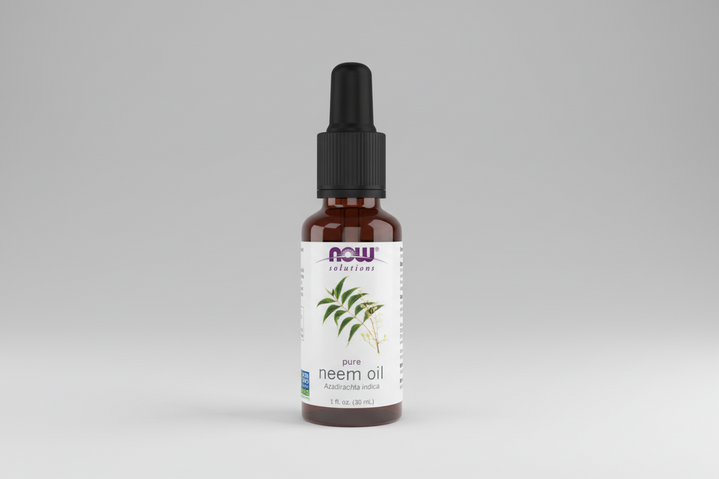 Bottle of NOW Solutions pure neem oil on a white background