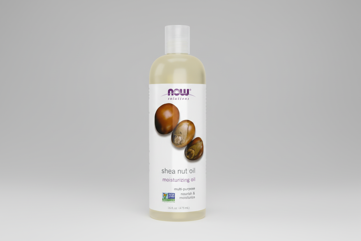 Shea nut oil moisturizing oil bottle with NOW Solutions label on a white background