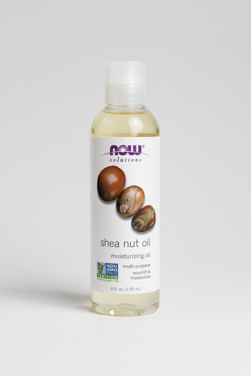 Bottle of NOW Solutions shea nut oil on a white background