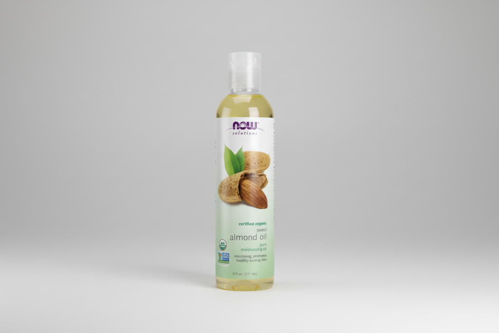 Bottle of NOW Solutions almond oil on a white background