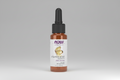 Bottle of NOW Vitamin E Oil on a white background