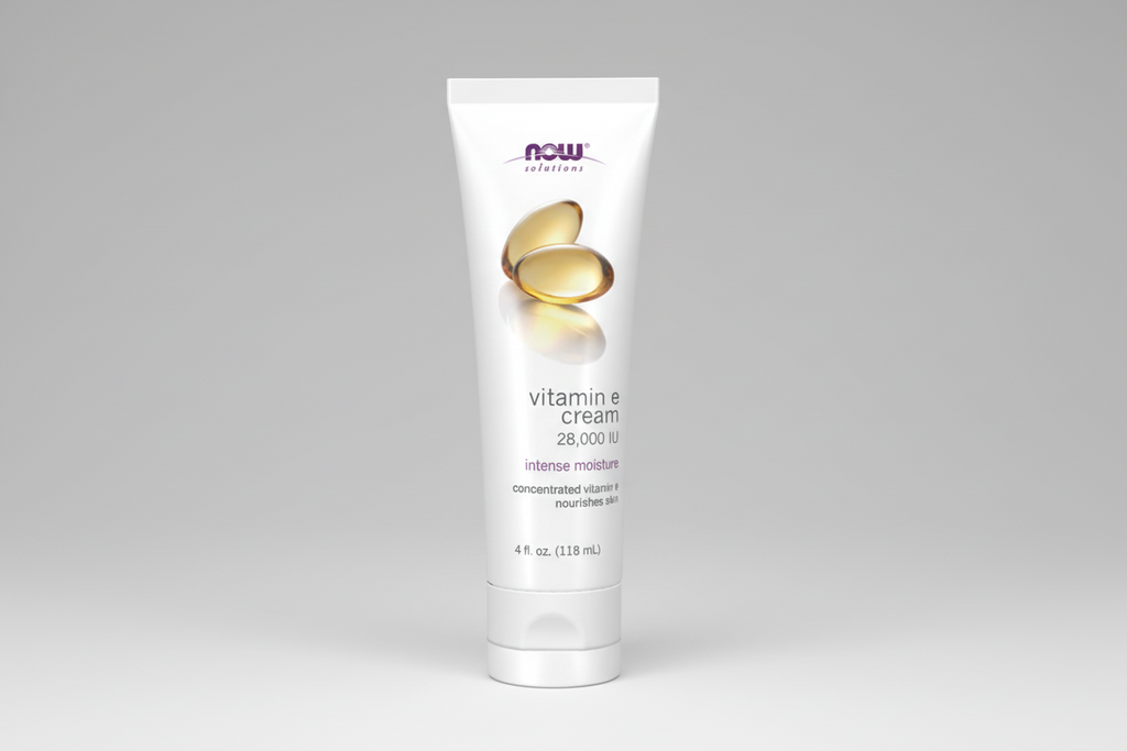 Tube of NOW Vitamin E Cream on a white background