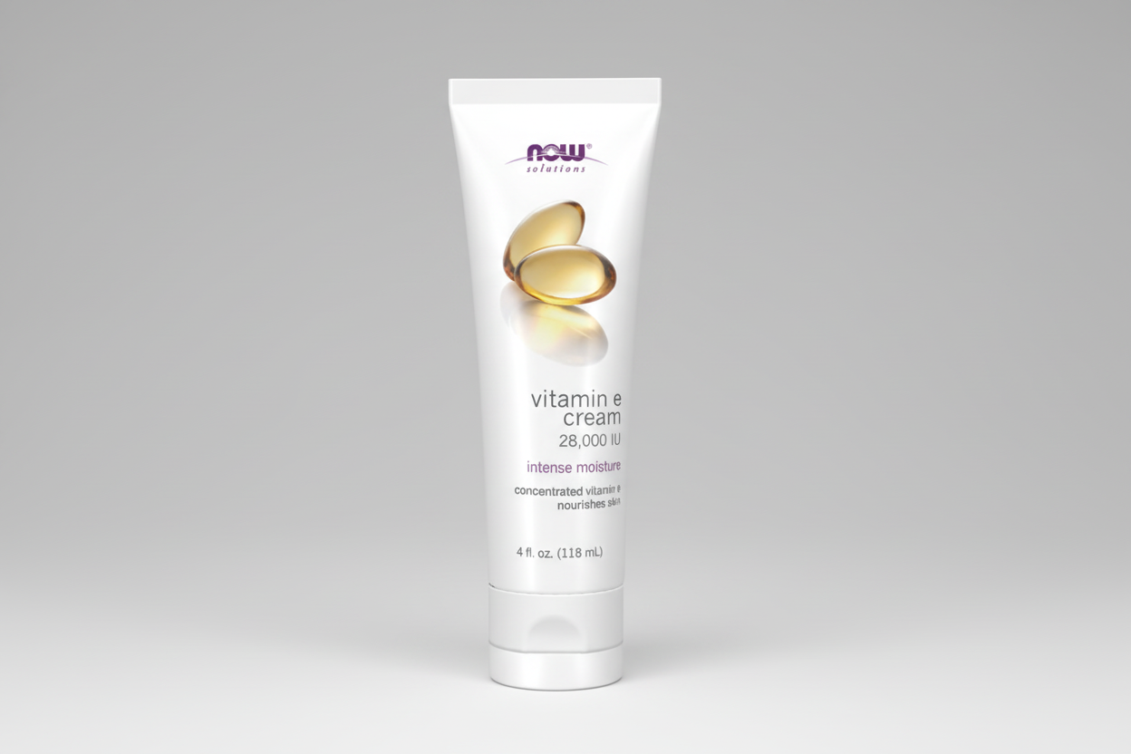 Tube of NOW Vitamin E Cream on a white background