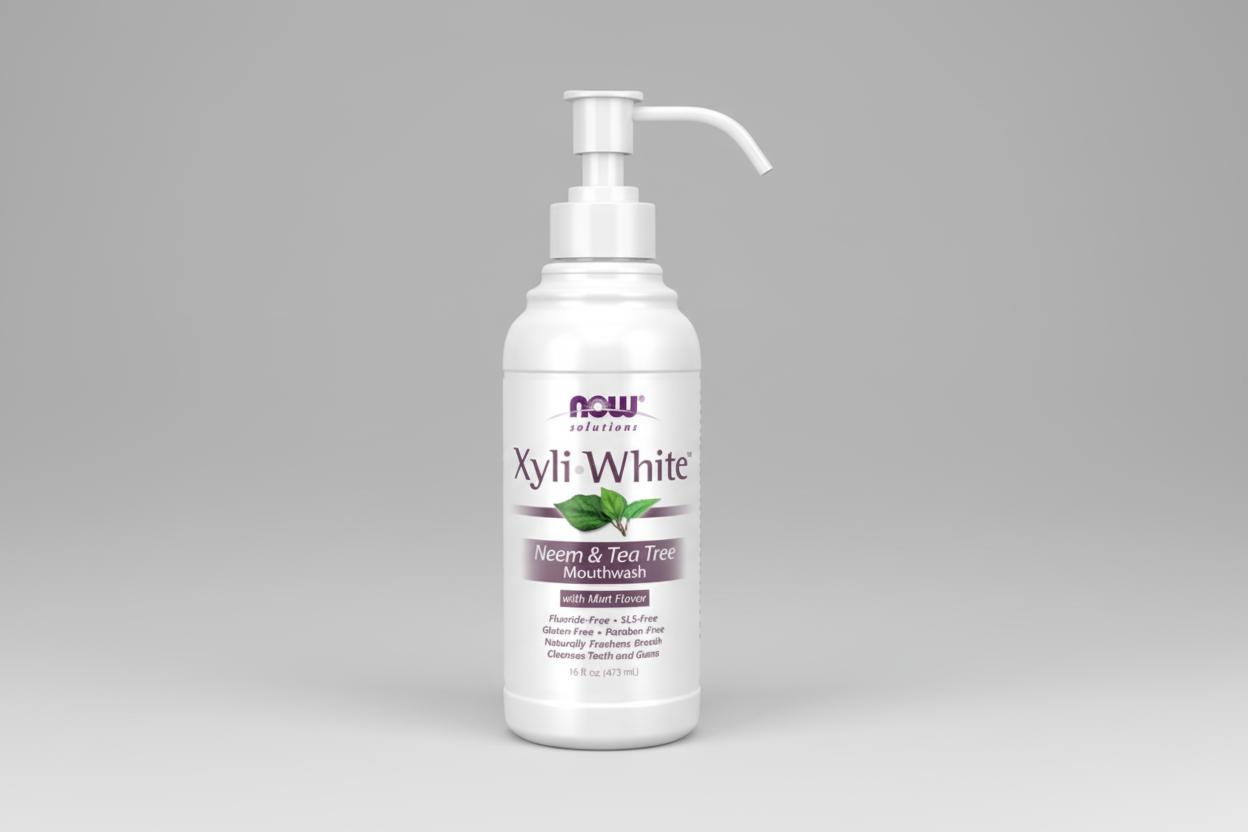 Xyli White mouthwash bottle with Now Solutions logo on a white background
