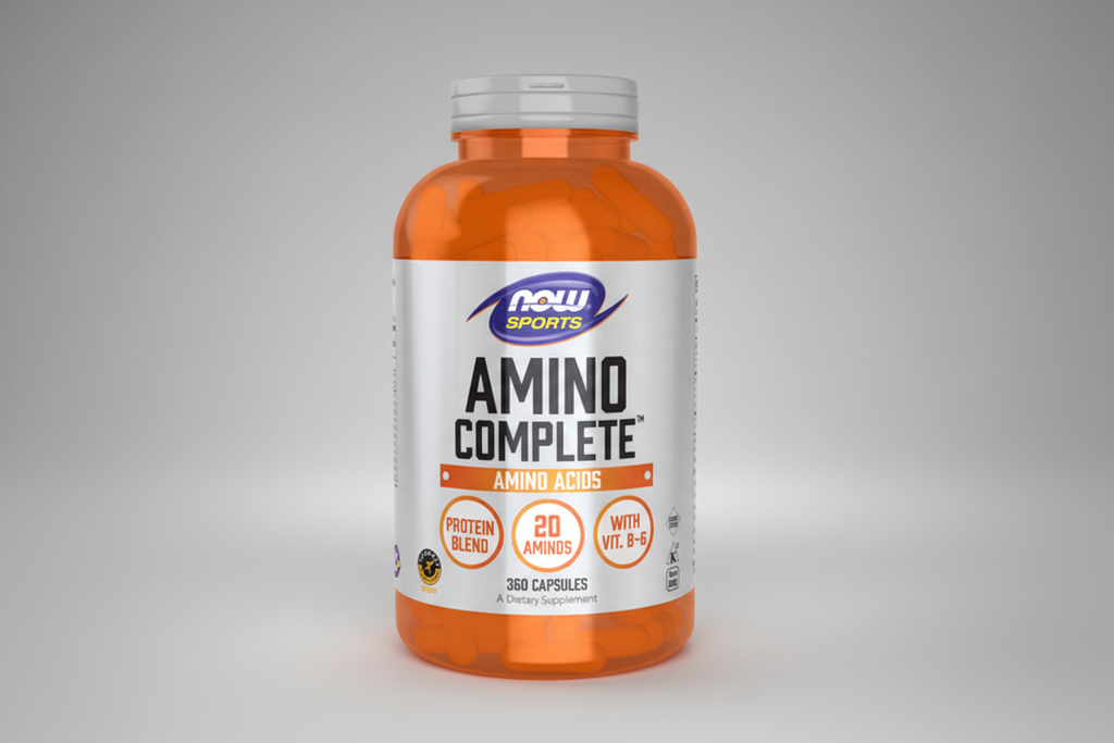 Orange supplement bottle labeled 'Amino Complete' by NOW Sports on a white background