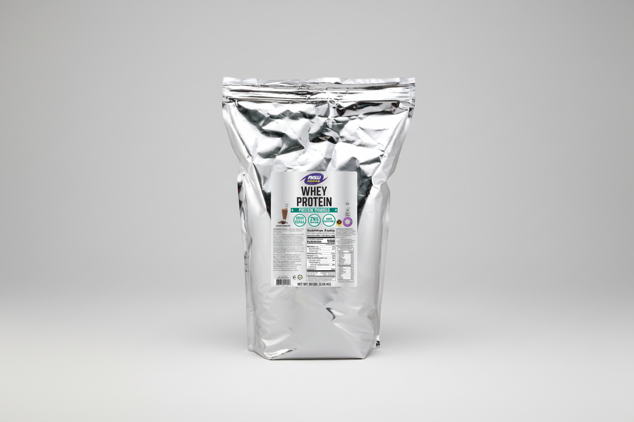 Clear bag of whey protein powder with a label on a white background