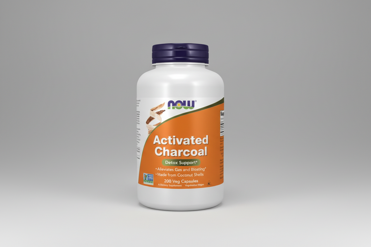 Supplement bottle labeled 'Activated Charcoal' by NOW on a white background