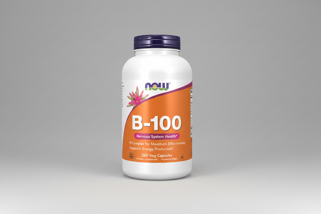 Supplement bottle labeled 'B-100' with a white and orange design on a white background