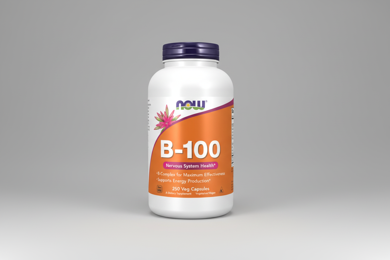 Supplement bottle labeled 'B-100' with a white and orange design on a white background