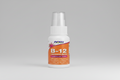 B-12 liposomal spray bottle with orange label on a white background