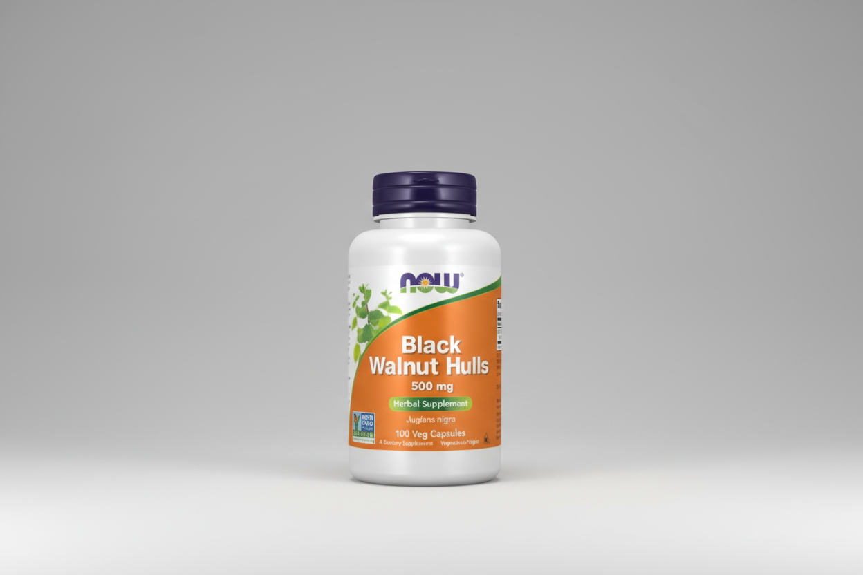 Supplement bottle labeled 'Black Walnut Hulls' with NOW brand on a white background