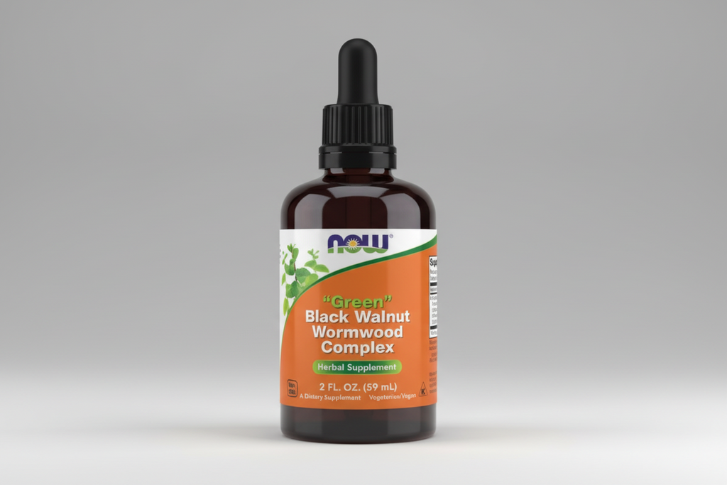 Herbal supplement bottle labeled 'Green Black Walnut Wormwood Complex' with Now brand on an orange background.