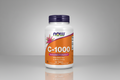 Vitamin C-1000 supplement bottle with NOW brand on a white background