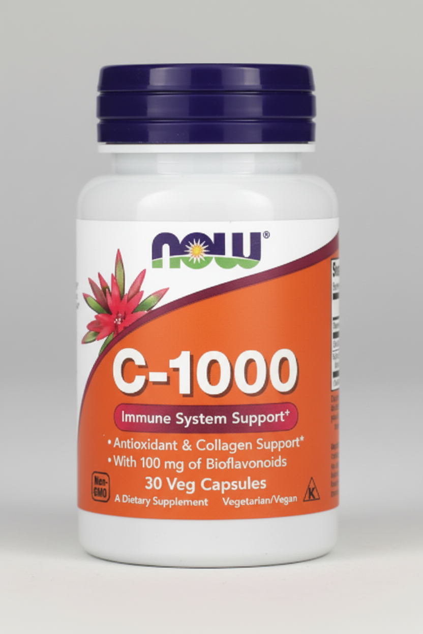 Supplement bottle labeled 'C-1000' with NOW brand on a gray background