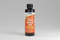 Bottle of NOW Flax Seed Oil on a white background