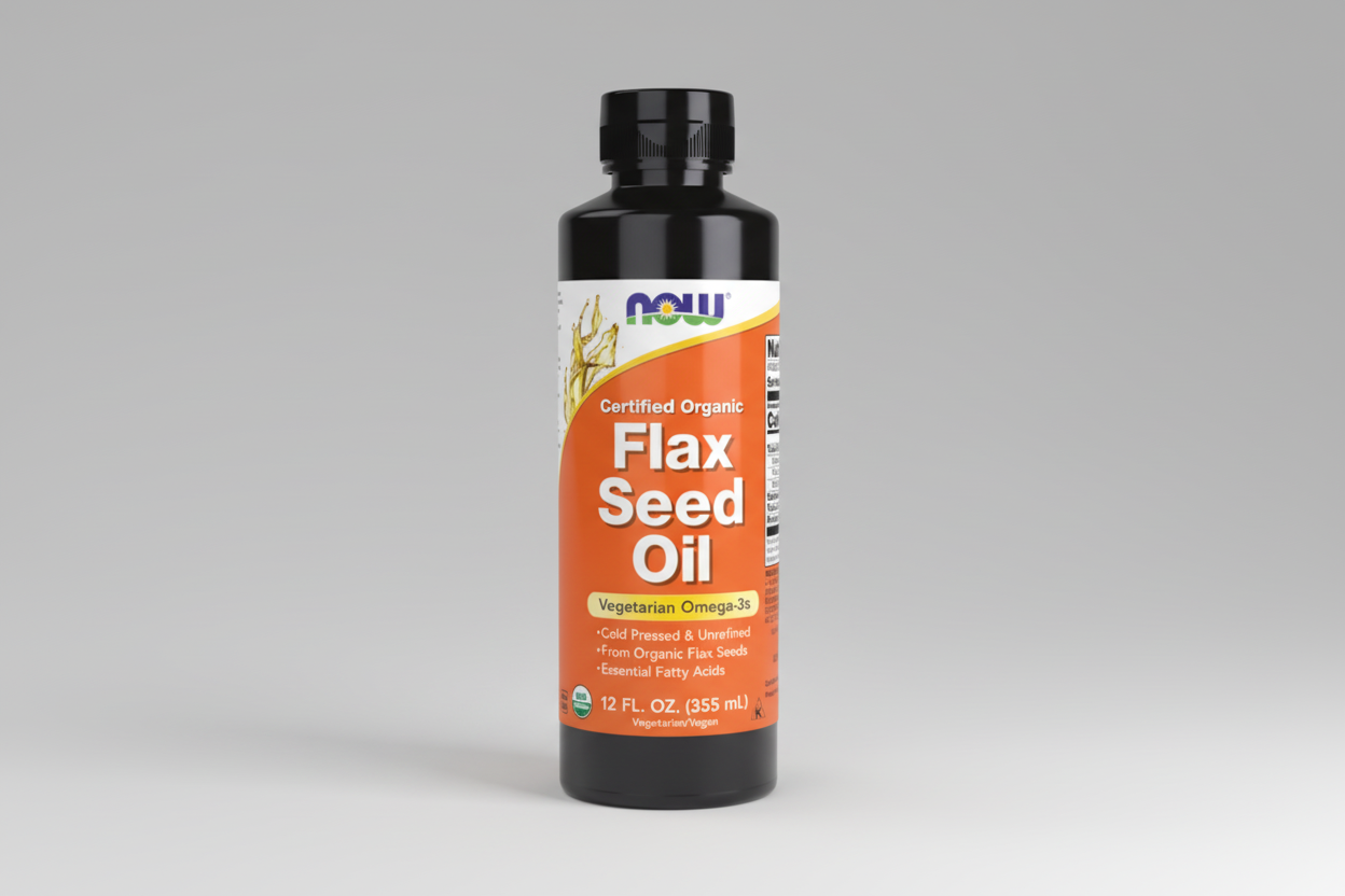 Bottle of NOW Flax Seed Oil on a white background