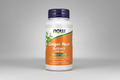 Ginger Root Extract supplement bottle with Now brand on an orange background