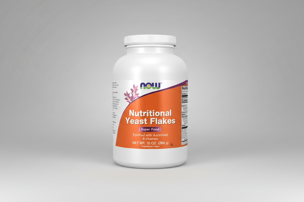 Bottle of NOW Nutritional Yeast Flakes on a white background