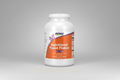 Bottle of NOW Nutritional Yeast Flakes on a white background