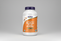 Bottle of NOW Psyllium Husk Powder with a purple cap on a white background